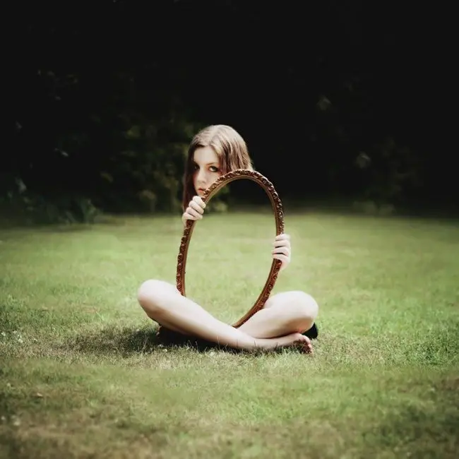 Self-portrait with mirror reflection illusion