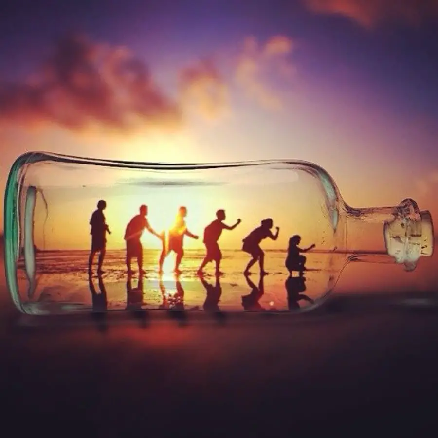 Forced perspective photography using everyday objects at beach