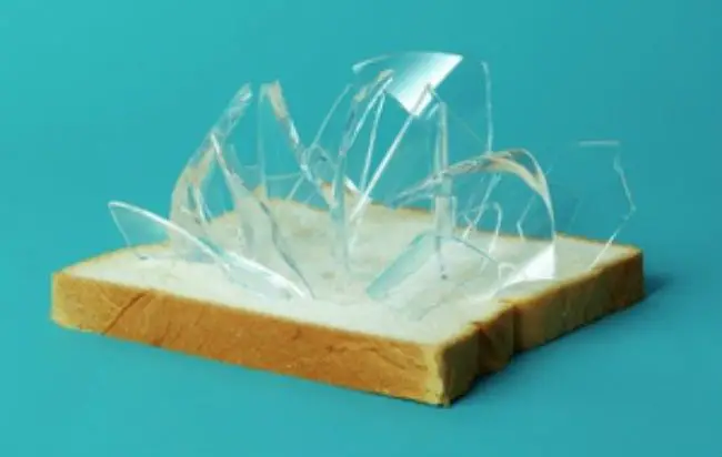Pick Up Broken Glass With A Piece Of White Bread