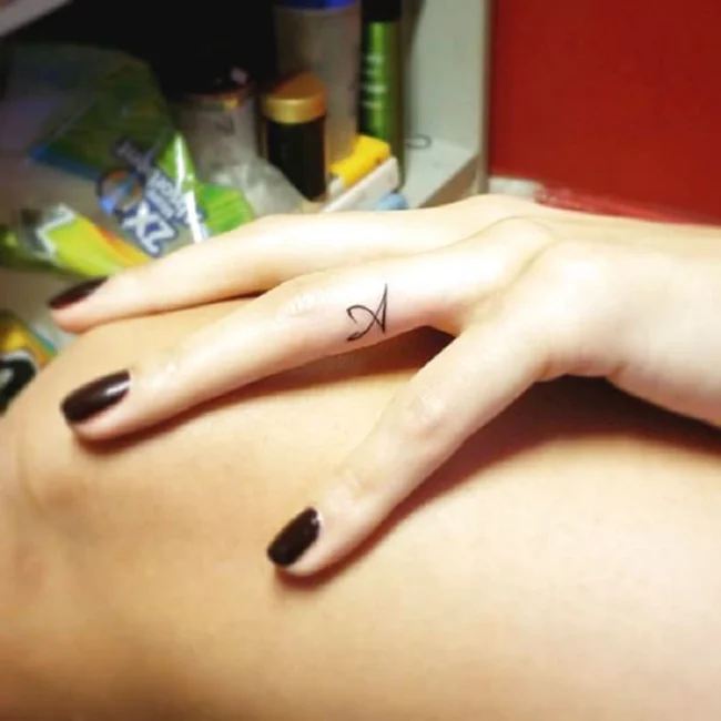 Alphabet Fingers Tattoo