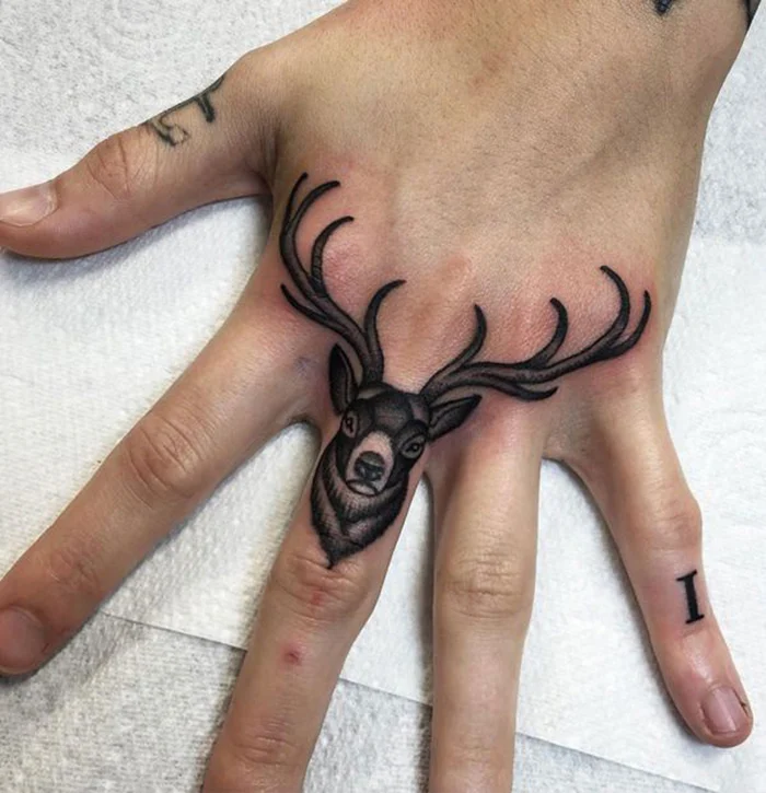 Animal's Face Fingers Tattoo