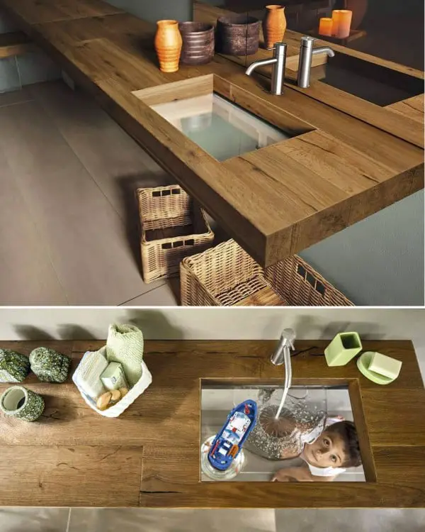 Bathroom sink made of wood with transparent glass bottom 