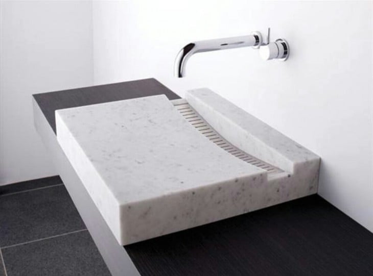 Bathroom washbasin in white marble stone 