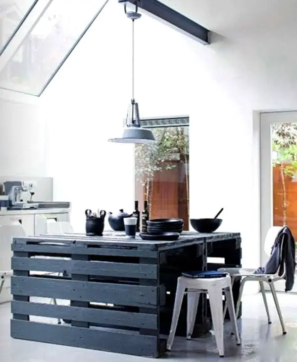 Black dining room made of DIY style pallets