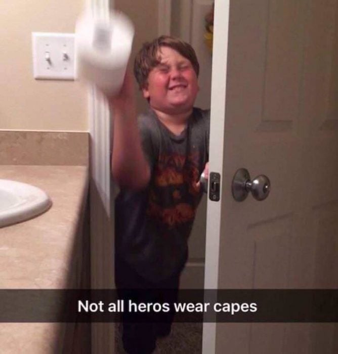 Boy carrying a toilet paper 