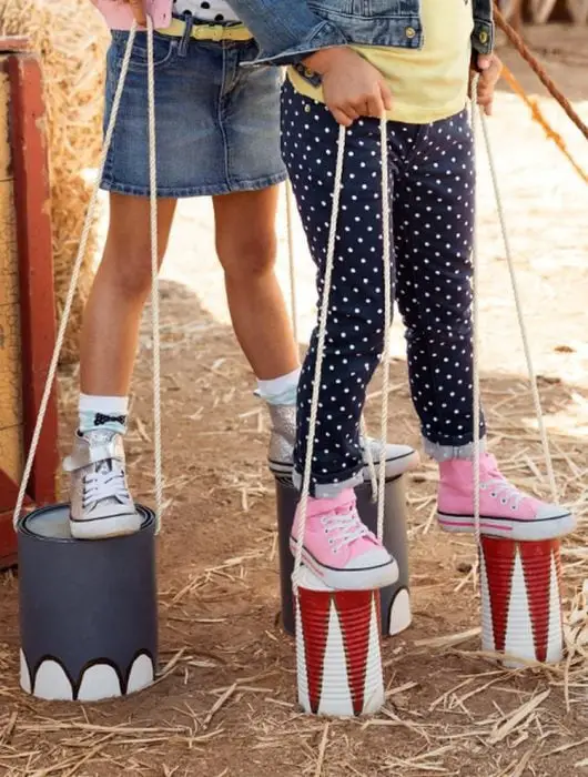 Children on tin stilts