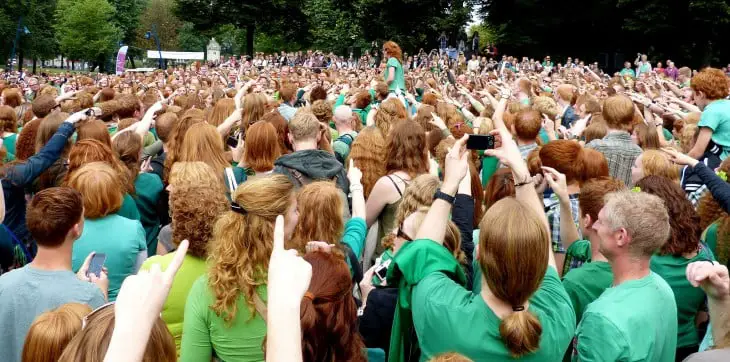 Crowd of red-haired people gathered 