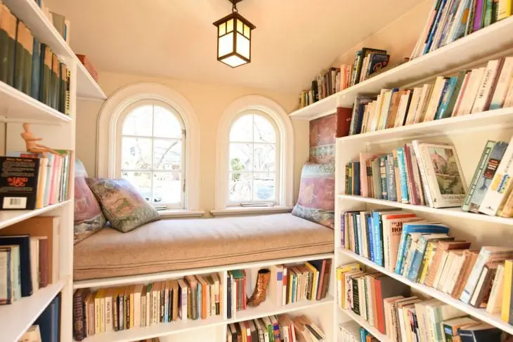 Daybed surrounded by shelves