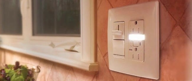Electrical outlet with built-in light 