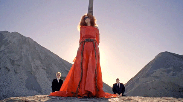 GIF where a red-haired witch is burned 