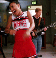 Glee Cheerleader Singing Happily In Her Class