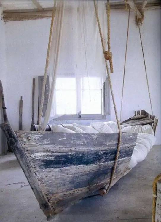 HANGING BED MADE FROM AN ANTIQUE BOAT