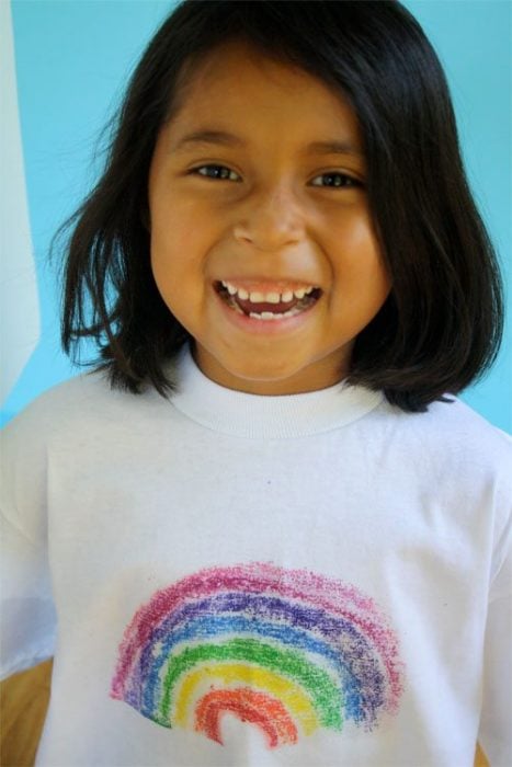Little girl wearing T-shirt designed by Crayons