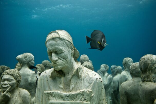 Sculpture Of A Man May Be Tired Underwater From The Reefs Of Cancun