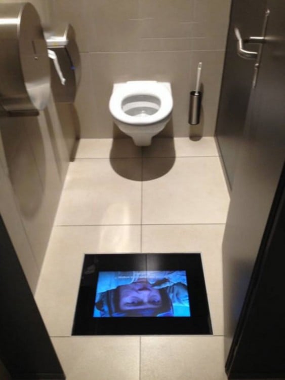 Screen on the floor of the cinema bathrooms