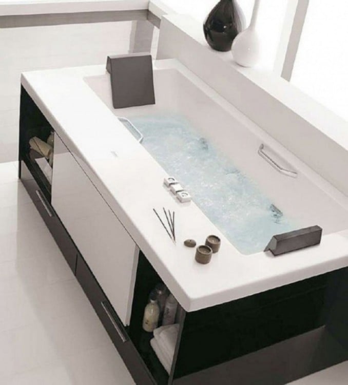 Soaking tub with drawers and shelves to accommodate things 