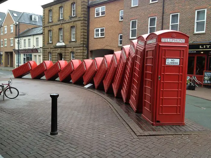 Street art with phone booths in London