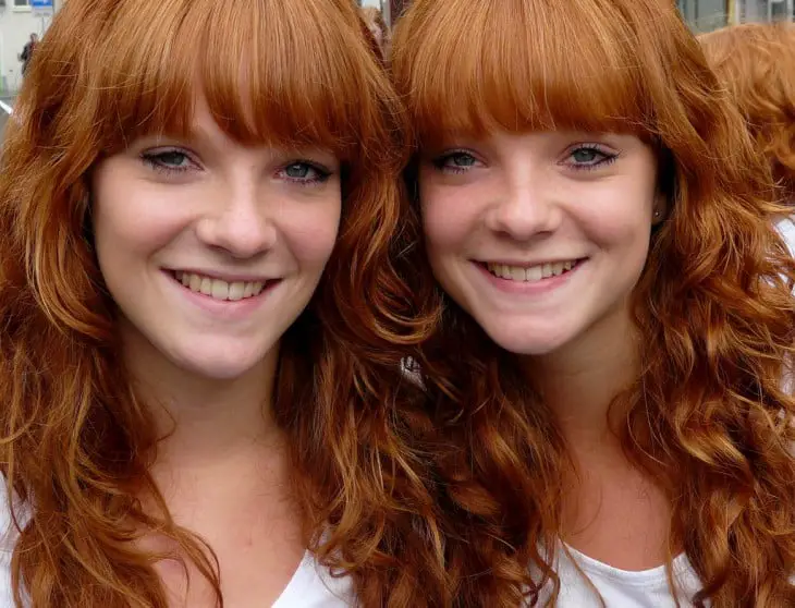 Two twin girls who have red hair 