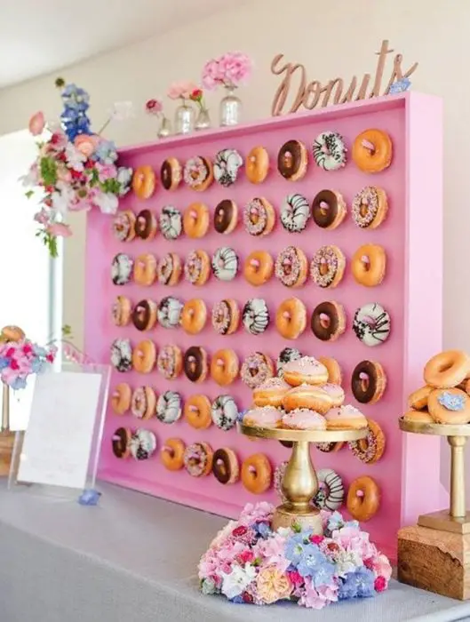 Wall of delicious doughnuts for party