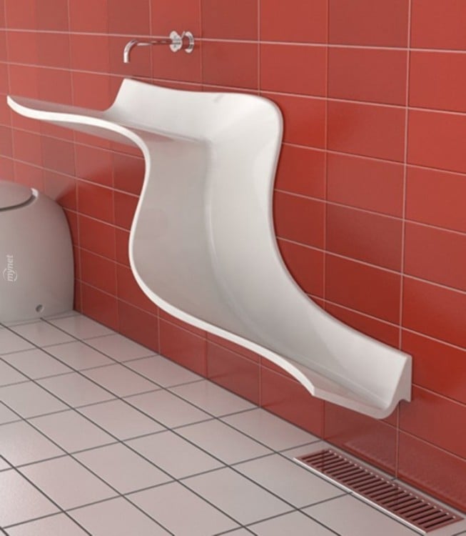 White bathroom sink in the shape of a slide 