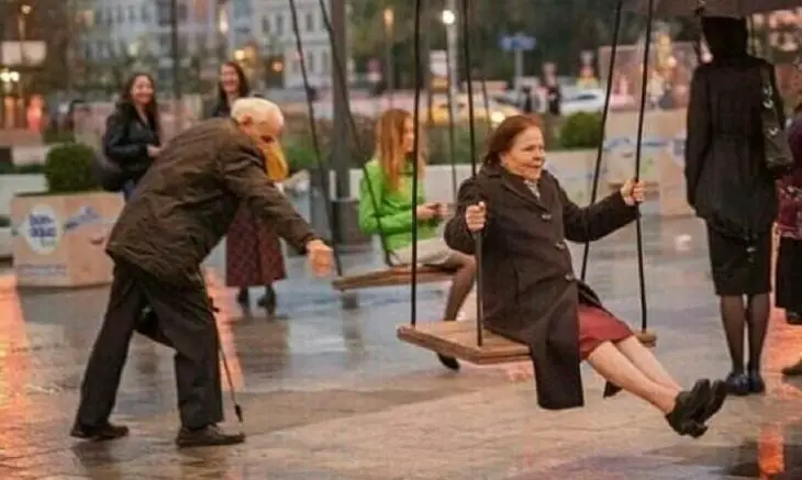 Grannies playing on the swings 