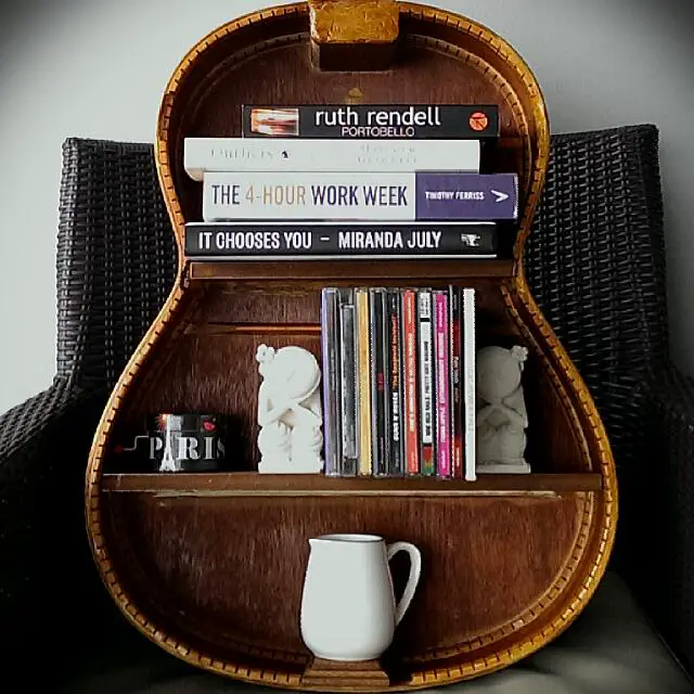 Guitar used as a bookcase