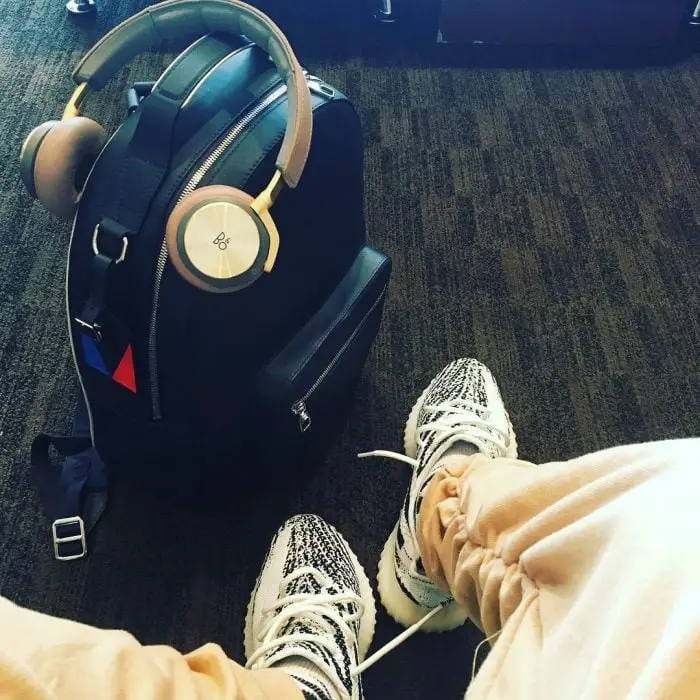 Headphones, suitcase and shoes 