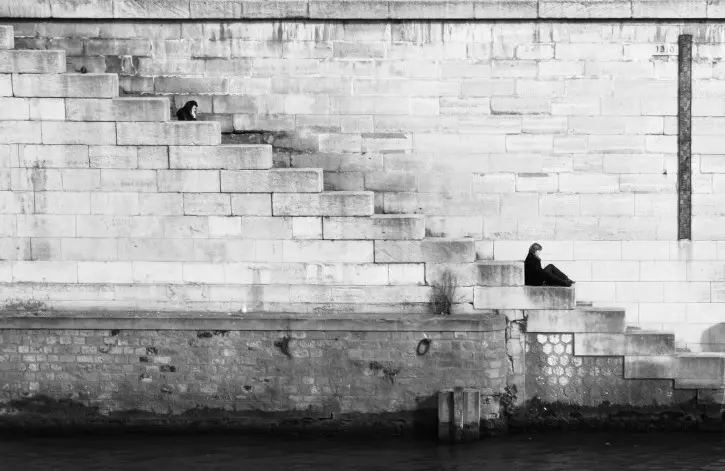Lonely person on the stairs black and white