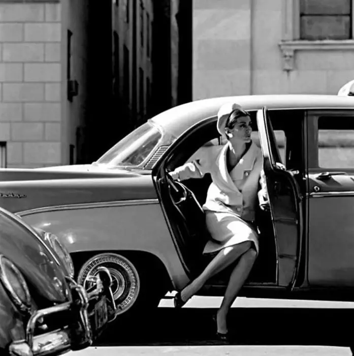 MODEL GETTING OUT OF CAR IN NY AROUND 1958