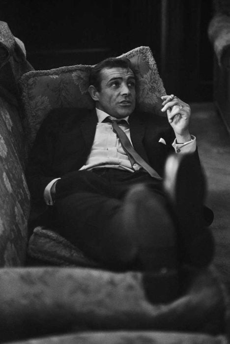 SEAN CONNERY LYING ON A COUCH