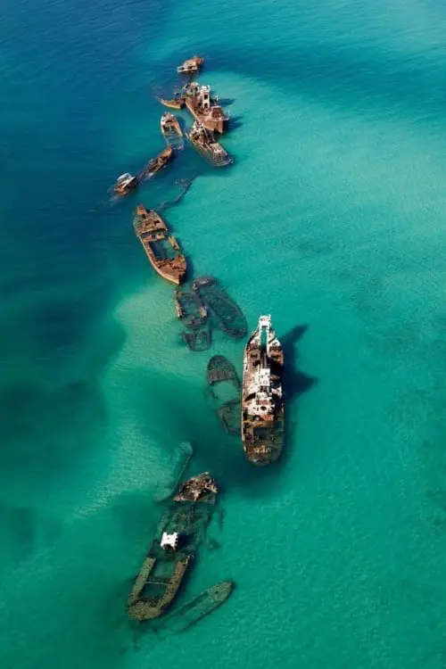 Sunken ships in crystal clear water