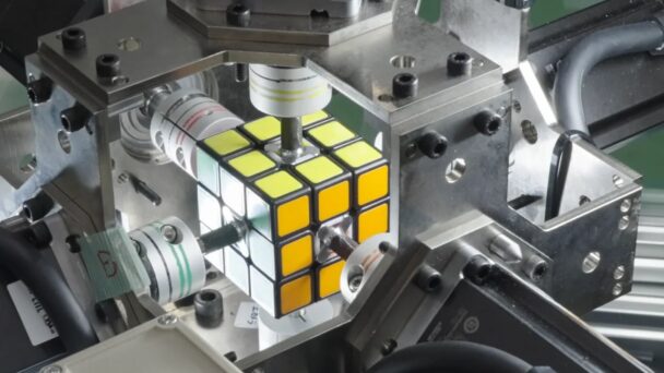 The Robot Uses Artificial Intelligence To Analyze Colors And Execute Movements Of A Rubiks Cube
